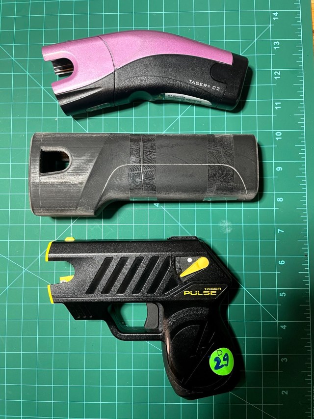 The evolution of design: The original, now-retired, TASER Bolt/C2 pictured at top, a 3D-printed model of the new TASER Bolt 2 in middle, and the currently available TASER Pulse at bottom. The Bolt 2 is packed with the same non-lethal stopping-power of the TASER Pulse and its law enforcement relatives – but in a comfortable, discreet form factor.